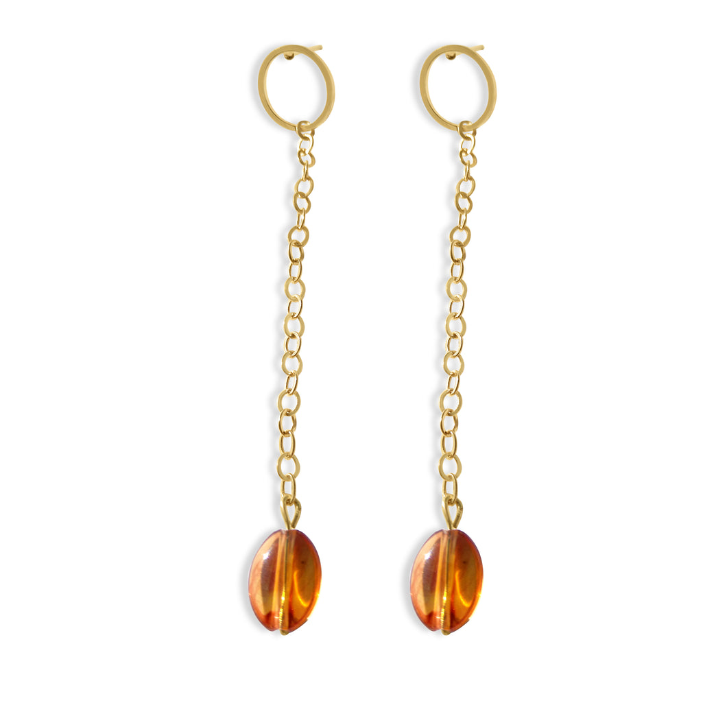 boucles d'oreilles ovales réalisées par Marie France Design en or et ambre