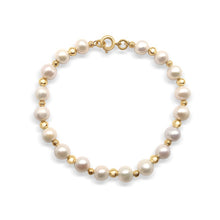 Magnifique bracelet en perles naturelles et plaqué or 18 k fait à la main par Marie France Design